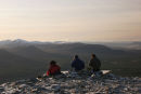 07-4685 Three Walkers Enjoying the Winter View Over Loch Morlich From Meall a' Bhuachaille Cairngorms Scotland